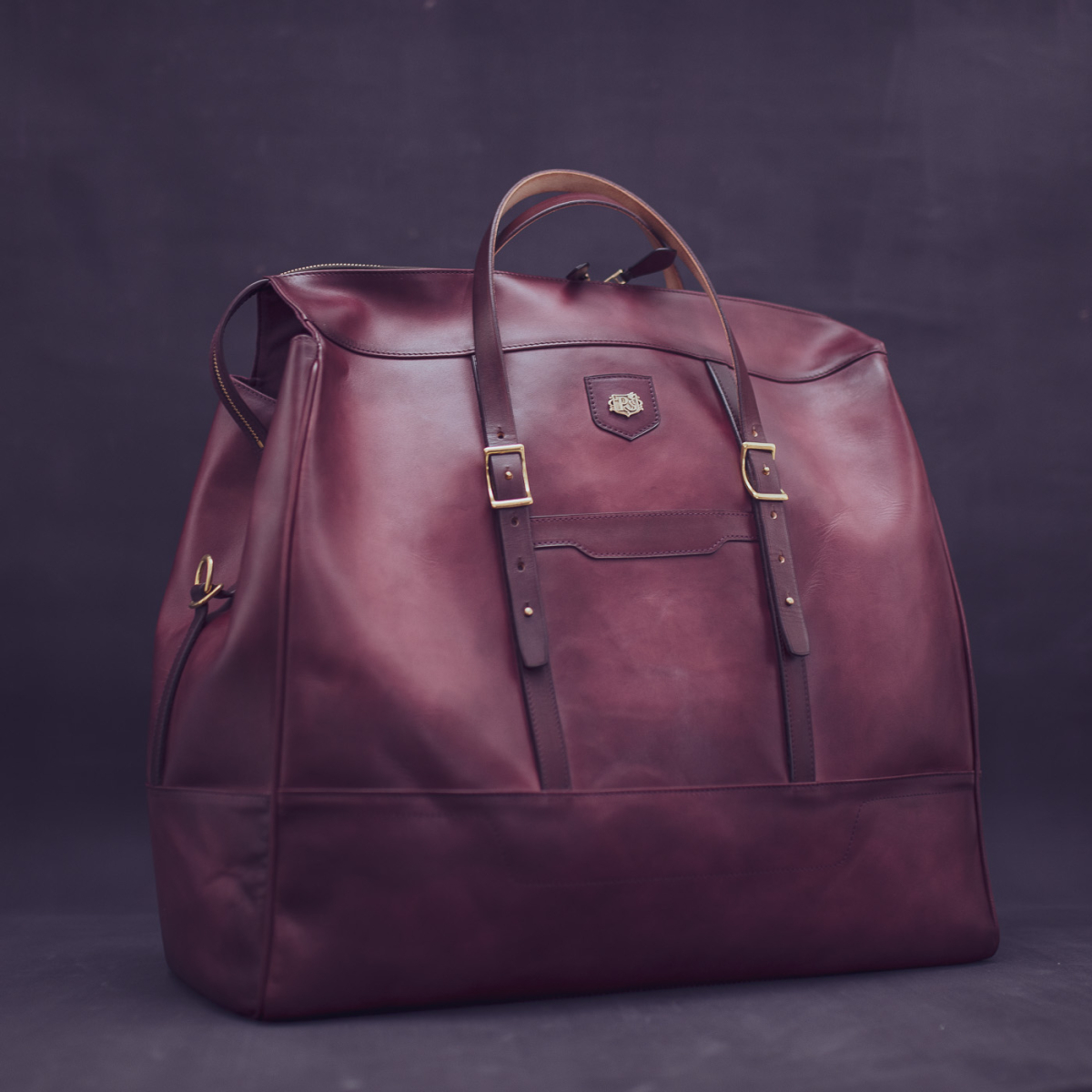 Шкіряна дорожня сумка WEEKENDER з регульованими ручками: Bordeaux